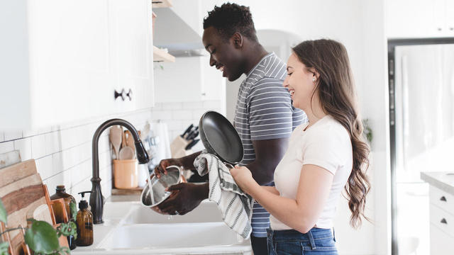 couple doing dishes 
